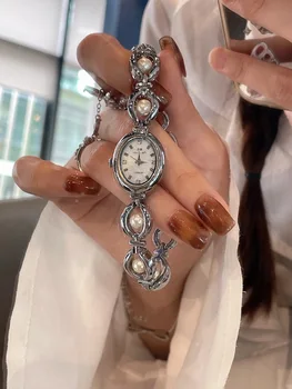 Модерен дамски часовник с перлата на wsop гривна в стил принцеса, луксозни и ежедневни кварцови часовници в ретро стил, темпераментни популярни часовник с малък циферблат Модерен дамски часовник с перлата на wsop гривна в стил принцеса, луксозни и ежедневни кварцови часовници в ретро стил, темпераментни популярни часовник с малък циферблат 0